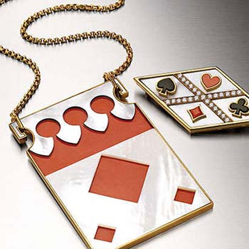 Gioielli Bulgari: collana e spilla 'carte da gioco' in oro